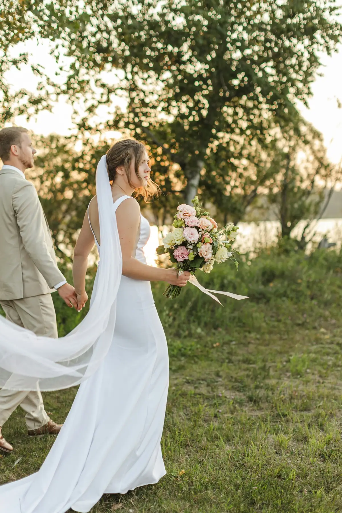 A bride holding her bouquet of flowers